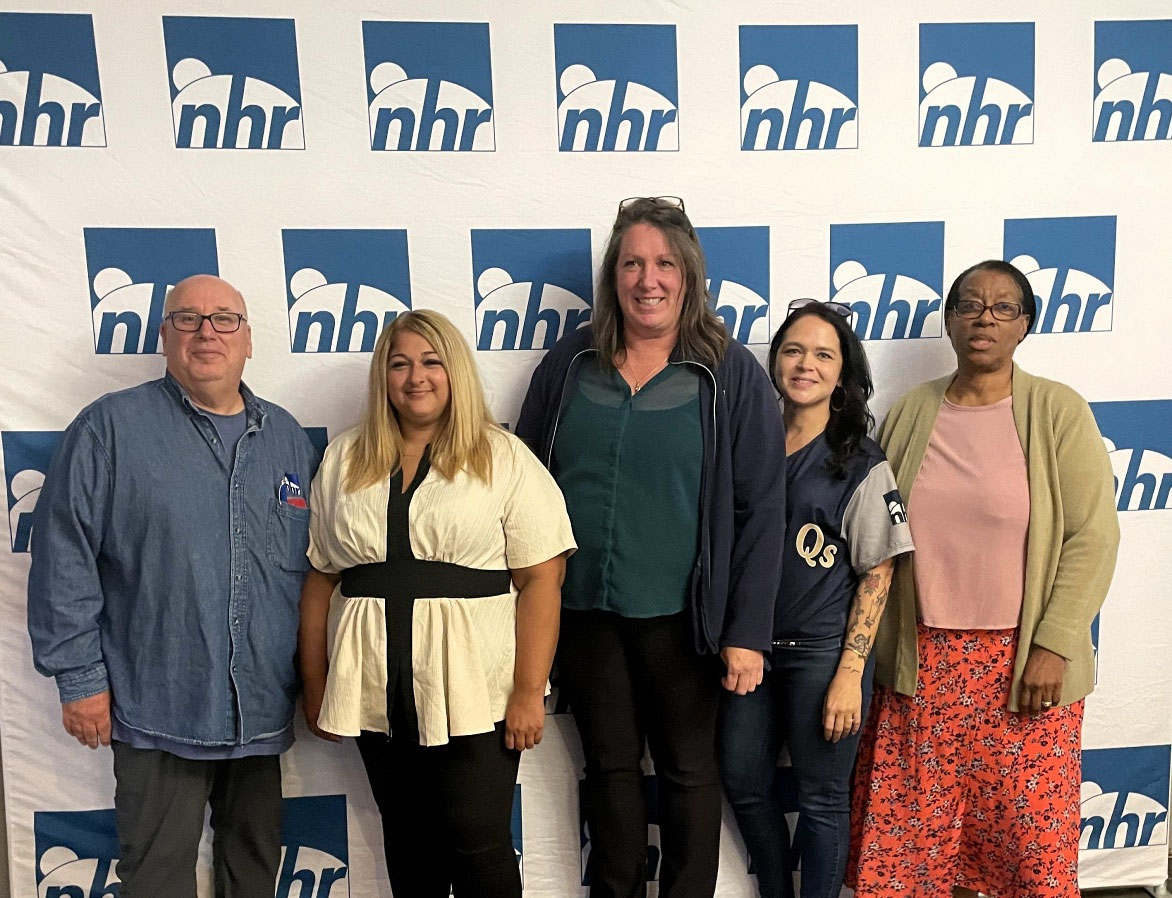 Kacey Mitchell (center) flanked by earlier Goldman Award
winners. From the left Tom McCluskey, Brianna Malvai,
New Horizons Resources, Inc. Sarah Civile and Hope Badroe.